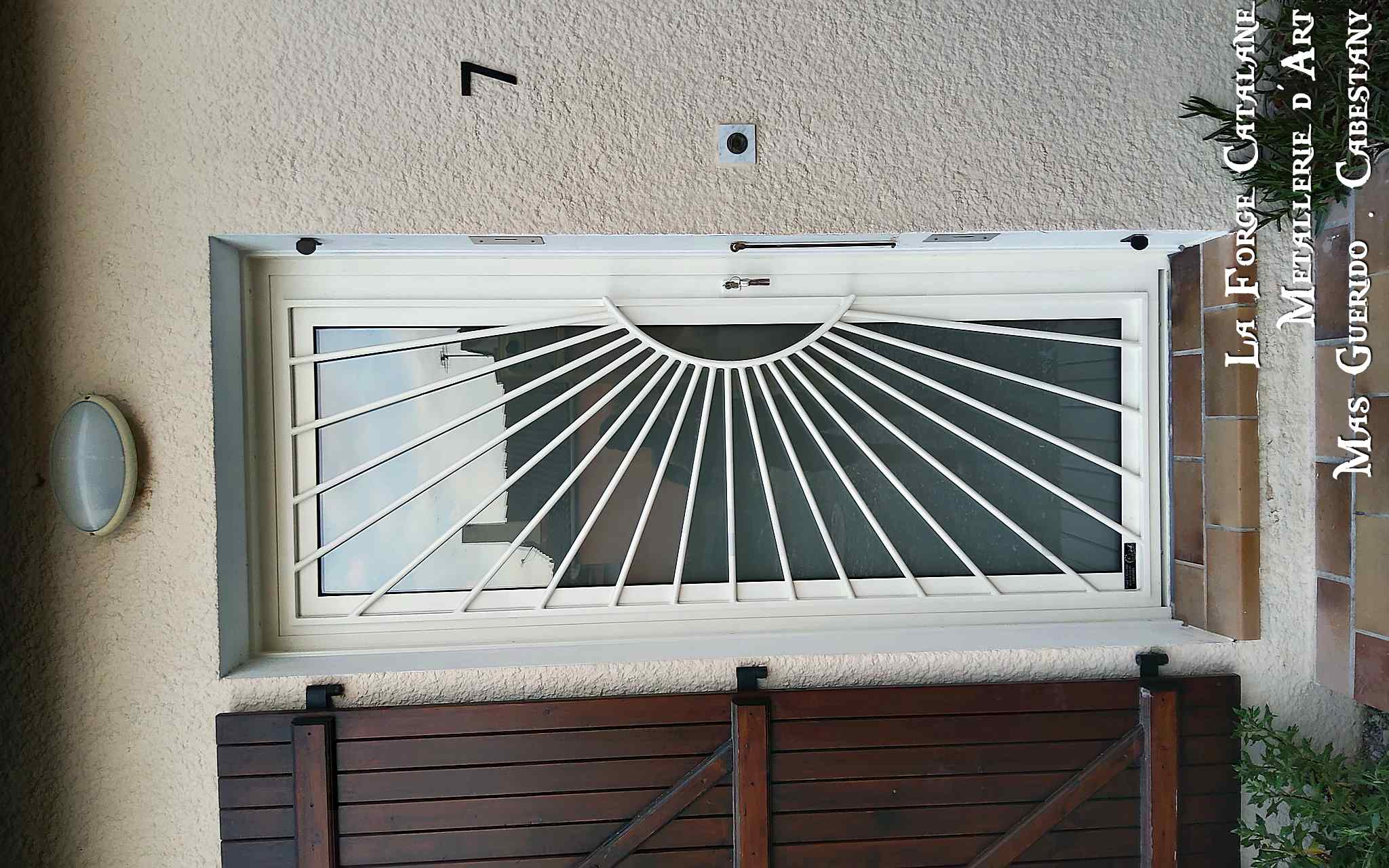 porte entree remplissage soleil forge catalane.jpg